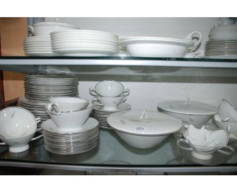 A good quantity of Rosenthal German Dinnerware including dinner and side plates, soup cups and saucers, lidded serving dishes