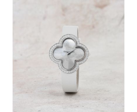 Van Cleef &amp; Arpels. A fine lady's 18K white gold diamond set quartz wristwatch with mother of pearl dialModel: AlhambraRe