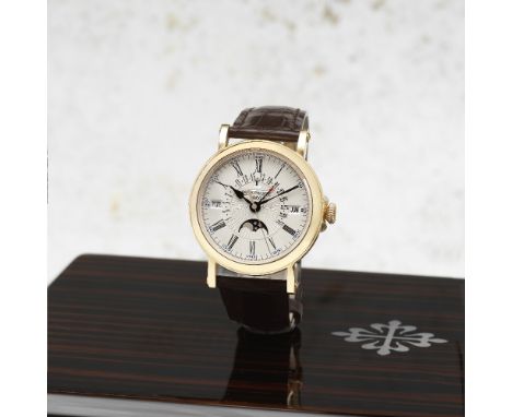 Patek Philippe. A fine 18K rose gold automatic perpetual calendar wristwatch with moon phase, leap year indication and retrog