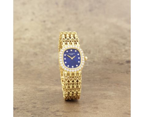 Patek Philippe. A lady's 18K gold and diamond set quartz bracelet watchModel: EllipseReference: 4941/2J-010Date: Purchased 19