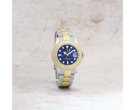 Rolex. A lady's stainless steel and gold automatic calendar bracelet watchModel: Yacht-MasterReference: 168623Date: Circa 199