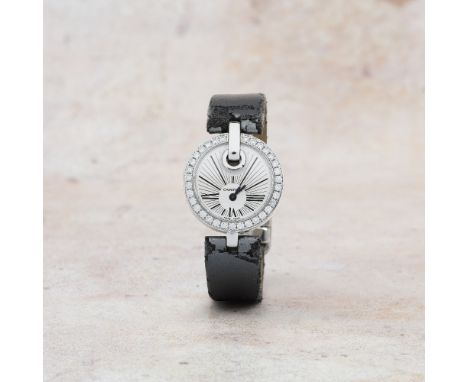 Cartier. A fine lady's 18K white gold diamond set quartz wristwatchModel: CaptiveReference: 3117Date: Purchased 11th March 20