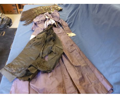 Victorian clothing consisting of purple silk skirt & jacket, black blouse & a black piano shawl.