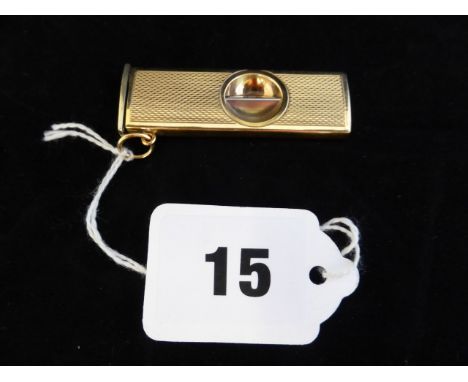 A 9ct gold cigar cutter, W.M.LD., Birmingham 1997, rectangular with engine turned decoration, 2 1/8in. (5.4cm.) long.