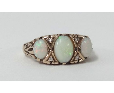 A 9ct opal and diamond ring, size M.