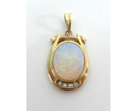 A 14ct opal and diamond set pendant.