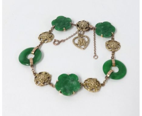 A jade and yellow gold bracelet.