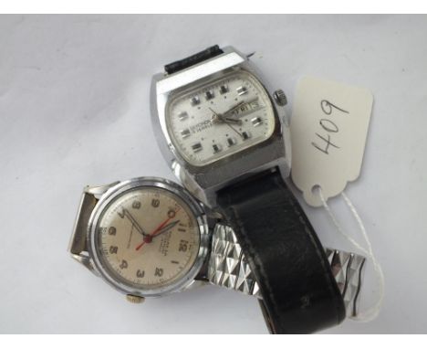 A gents Sekonda wristwatch with seconds sweep and calendar dial, in working order, and a gents wristwatch by Fallas with seco