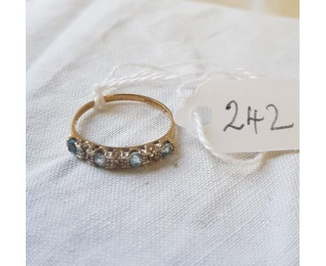 A aquamarine &amp; diamond 1/2 eternity ring in 9ct - size L.5 
