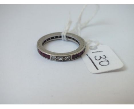 A DIAMOND &amp; RUBY ETERNITY RING SET IN PLATINUM - size L 