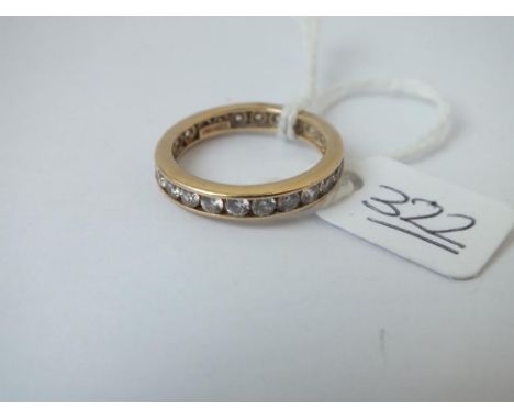 A CZ eternity ring in 14ct gold - size O - 2.8gms