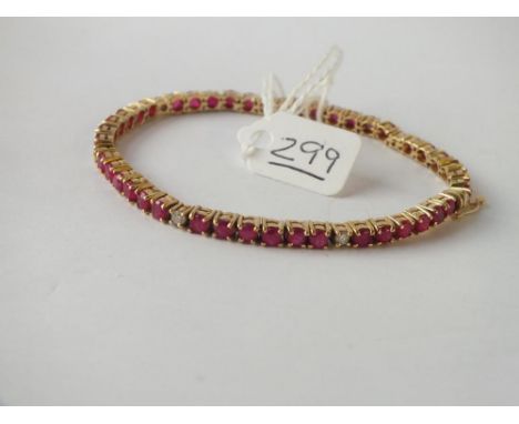 A RUBY &amp; DIAMOND BRACELET IN 18CT GOLD - 16.4gms