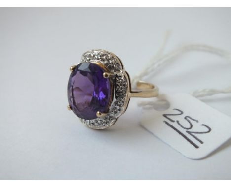 A 9ct dress ring set with amethyst - size L - 3.83gms