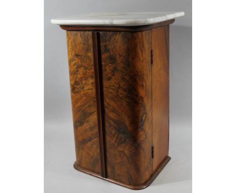 A principally late 19thC burr walnut side cabinet, of small proportion, the D-end carcass with moulded thumb mould opening, r