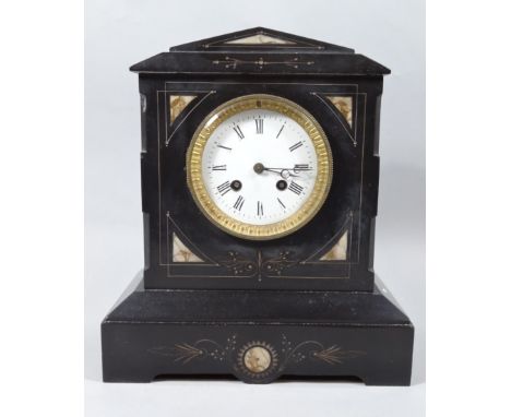 A late Victorian black slate mantel clock, of architectural design with 11cm dia. Roman numeric dial, an eight day pendulum s