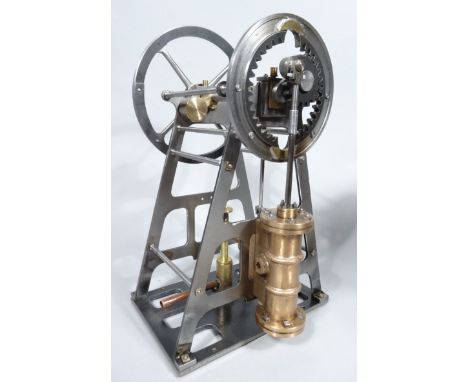 A 20thC Murray's style hypocycloidal static engine, with a rotating spoked flywheel on an 'A' frame and a with a brass steam 