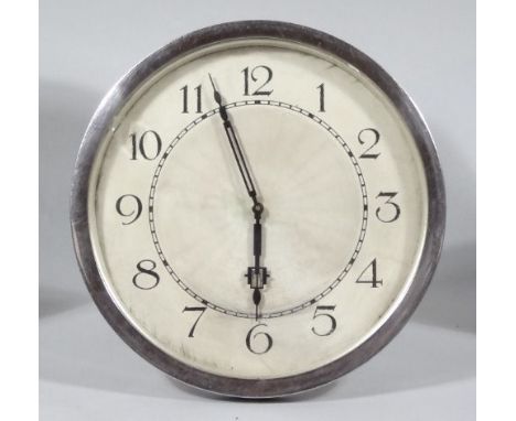 A mid 20thC Art Deco mantel clock, with circular chrome plated case, 18cm dia. Arabic dial, easel back. 