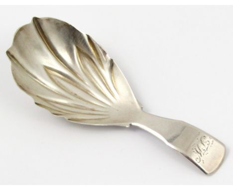 A George III silver caddy spoon, by Pemberton, initialled fiddleback pattern with feathered bowl, Birmingham 1811, 9cm wide 