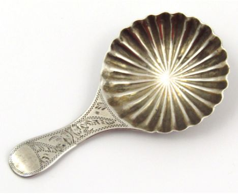 A George III silver caddy spoon, by Leeson & Vale, with engine turned handle and shell shaped bowl, Birmingham 1820, 6cm 