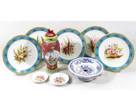 A set of four mid 19thC cabinet plates, probably English in the manner of Coalport, hand touched to the centre with summer fl