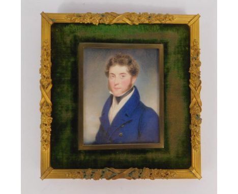 English School (19thC). Portrait of a gentleman in a blue jacket, blue length, half length miniature, 7.5cm x 6cm, in an ormo