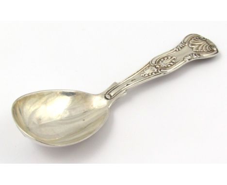 A large size Victorian silver caddy spoon, by Holland, shell capped kings pattern with plain bowl, London 1861, 12cm wide 