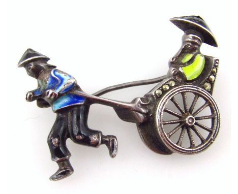 A Chinese brooch, of two oriental men pulling wagon, with enamel decoration and set with tiny marquise, white metal, marked 8
