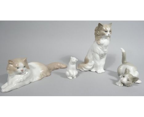 Various Nao figures, to include cat 27cm wide, other kittens, etc., printed marks beneath. (4)