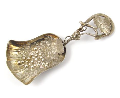 A decorative Victorian caddy spoon, by Hilliard & Thomson, with entwined berry and leaf handle, shaped bowl, repousse decorat