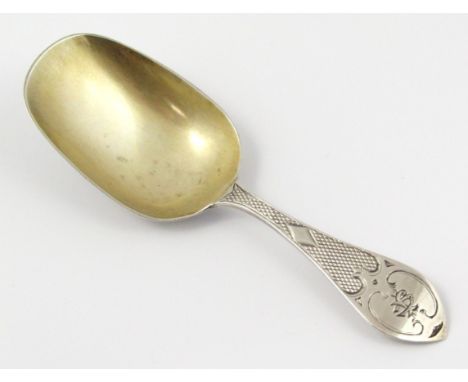 A Victorian silver caddy spoon, by Unite, with shaped part engraved handle and plain bowl with traces of silver gilt, Birming