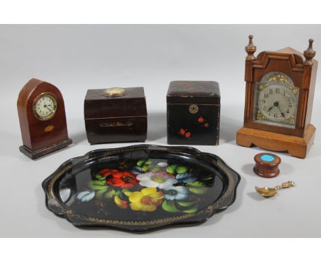 An early 20thC Arts and Crafts architectural design mantel clock, with 9cm wide, Arabic dial, pendulum swung movement, a mitr