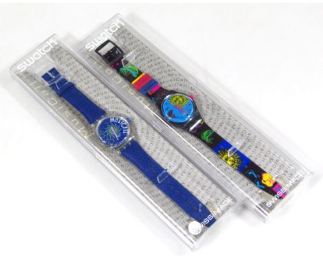 Two Swatch watches, to include the musical watch on blue strap and the Sunshine and fish design watch head on similar musical
