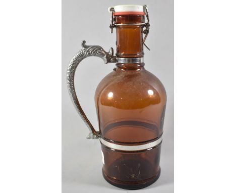 A Modern Amber Glass 2lt Cask Flask with Dolphin Handle, 33cm High 