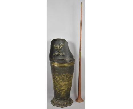 A Late 19th/Early 20th Century Pressed Brass Stick Stand Decorated In Relief with Lion and Griffin on Octagonal Base, 78cm hi