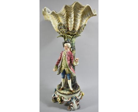A Continental Figural Table Centre Bowl In the Form of Scalloped Shell Supported by Tree Trunk with Standing Dandy, Missing S