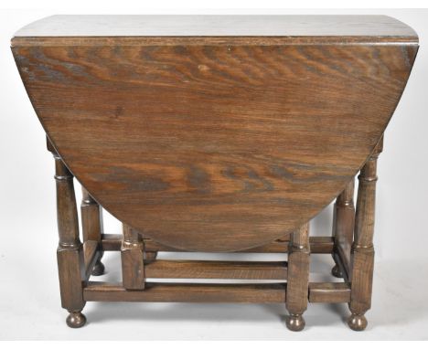 An Edwardian Oak Drop Leaf Gate Leg Oval Topped Dining Table, 91cm Long 