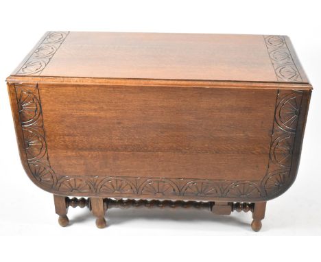 An Edwardian Oak Drop Leaf Barley Twist Gate Leg Dining Table with Carved Border, 107cm wide 