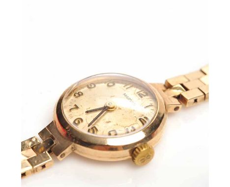 TWENTIETH CENTURY LADY'S NINE CARAT GOLD MARVIN COCKTAIL WATCH
signed seventeen jewels calibre 150 manual wind movement, the 