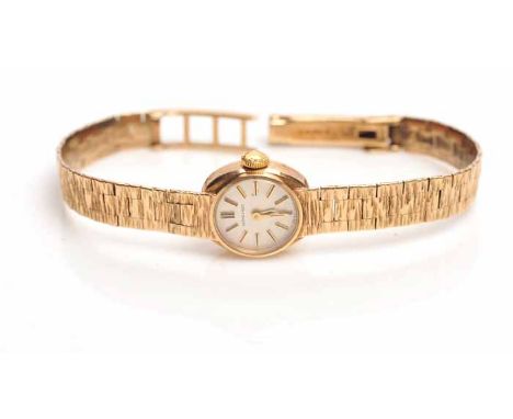 LADY'S TWENTIETH CENTURY NINE CARAT GOLD LONGINES COCKTAIL WATCH
signed calibre 410 manual wind movement numbered 50525726, t