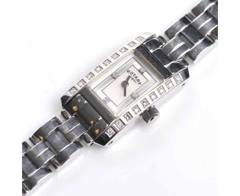 LADY'S DIAMOND SET ROTARY WRISTWATCH
quartz movement, the silvered dial with diamonds at the quater hours, the 14mm case set 