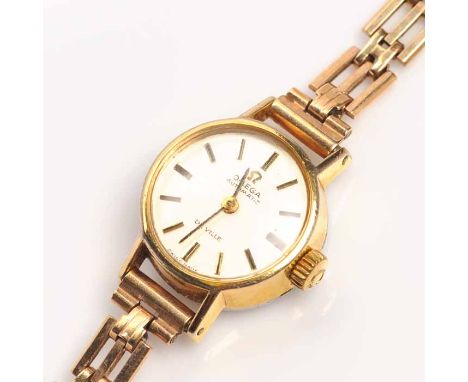 LADY'S NINE CARAT GOLD ROTARY COCKTAIL WATCH
signed manual wind movement, the silvered dial with Arabic numeral and baton hou