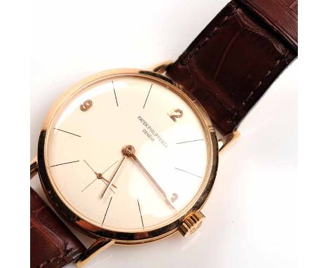 FINE AND RARE LARGE SIZED GENTLEMAN'S 1940s EIGHTEEN CARAT ROSE GOLD PATEK PHILIPPE GENEVE WRISTWATCH
1949, signed eighteen j