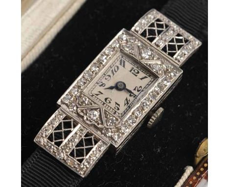 LADY'S ART DECO PLATINUM AND DIAMOND COCKTAIL WATCH
unsigned seventeen jewels manual wind movement numbered 41364, the silver