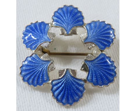 A Volmer Bahner Danish silver and blue enamel brooch of six scallop shells set in a circle, stamped VB STERLING DENMARK, diam