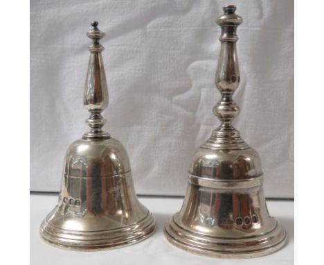 Two silver table bells - the first Britannia standard with a baluster stem, marks for London, 1928, maker's stamp Crichton br