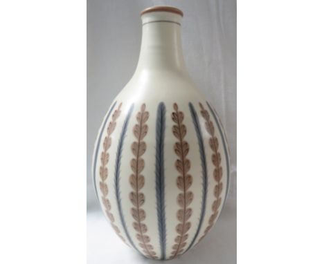 Poole pottery ovoid vase, cream ground with vertical lines of stylized leaves alternately in brown and blue, stamped number 6