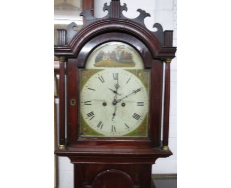 A late 19th century striking eight day long case clock by Denne of Chilham. The enamel and painted face with floral spray spa