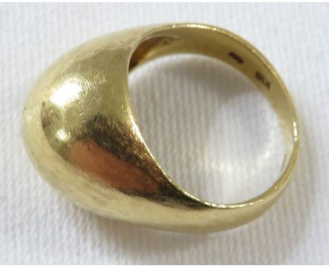 Yellow metal ring of raised bulbous form, the shank stamped 18 with other stamped marks, 8.7g, ring size K/L for guidance onl