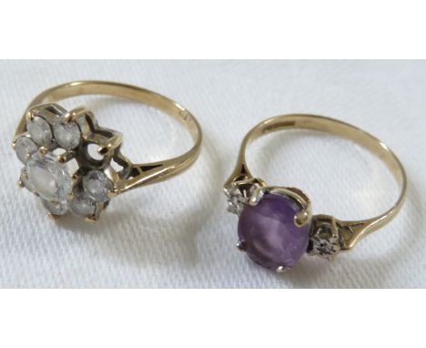 Two 9ct gold dress rings - the first with eight paste stones (one being absent) 2.6g, the second with an amethyst and two chi