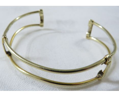 Yellow metal double wire bangle stamped 14K, (14.4g)